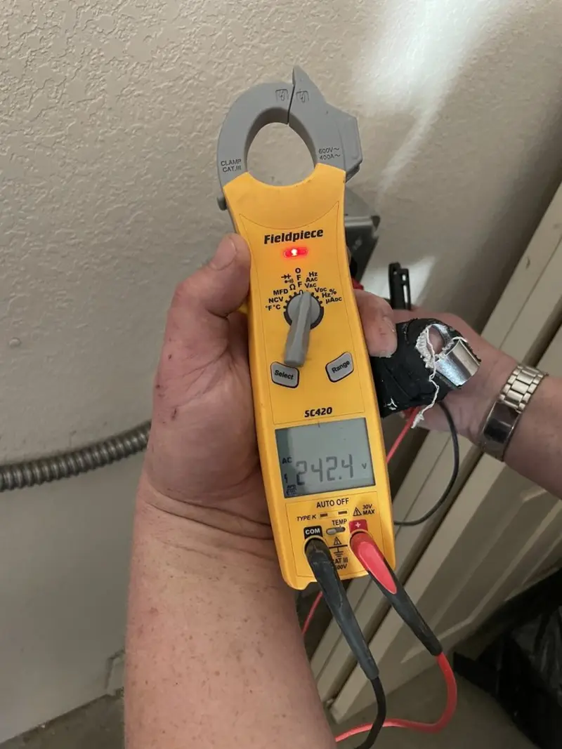 Voltage testing with clamp meter during Ceiling Fan Installation in Hopewell